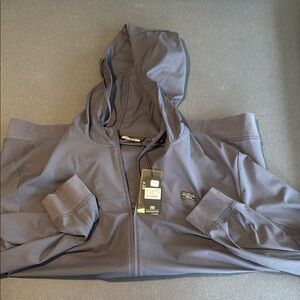 Travis Mathew Indigo Windbreaker Jacket with Modern Design